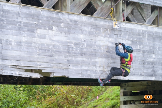 Climber on a covered bridge